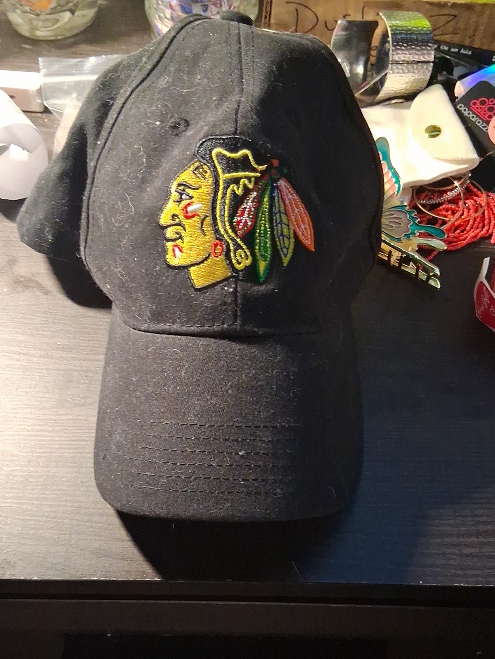 NHL Black Baseball Cap with Multicolor Feather Logo